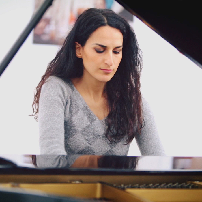 Sepideh Baradaran playing the piano front perspective